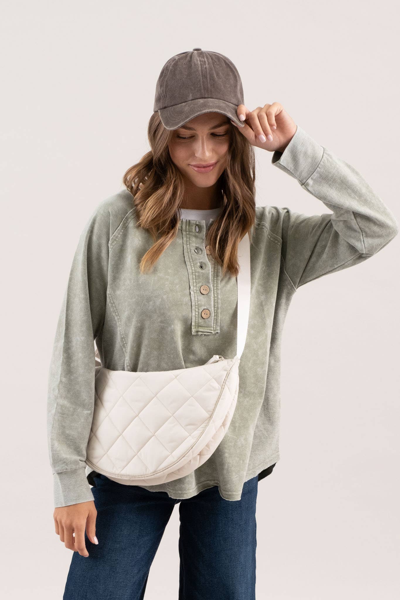 WASHED HENLEY RAGLAN LONG SLEEVE KNIT TOP