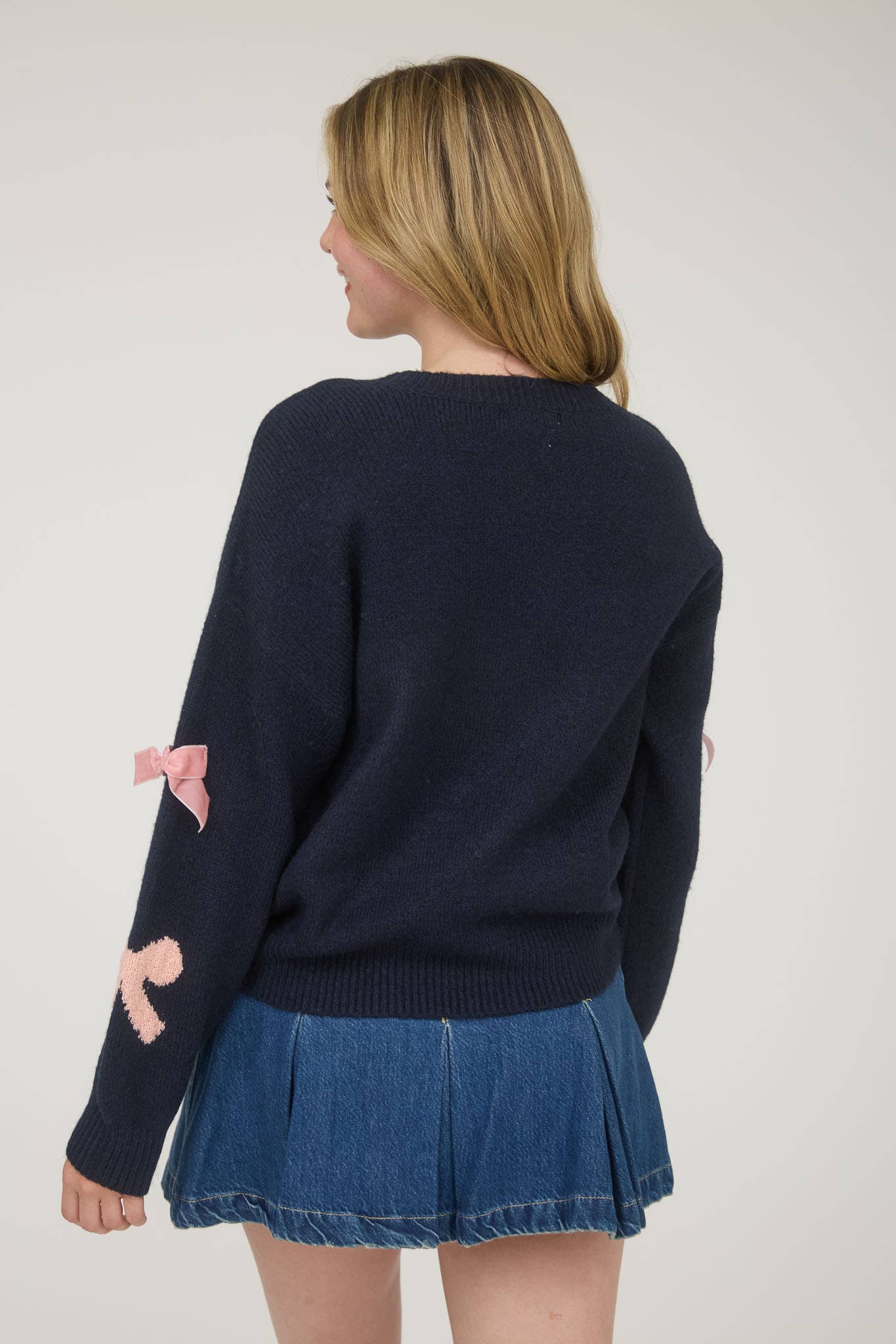 VERY DEMURE BOW PATTERN SWEATER: NAVY