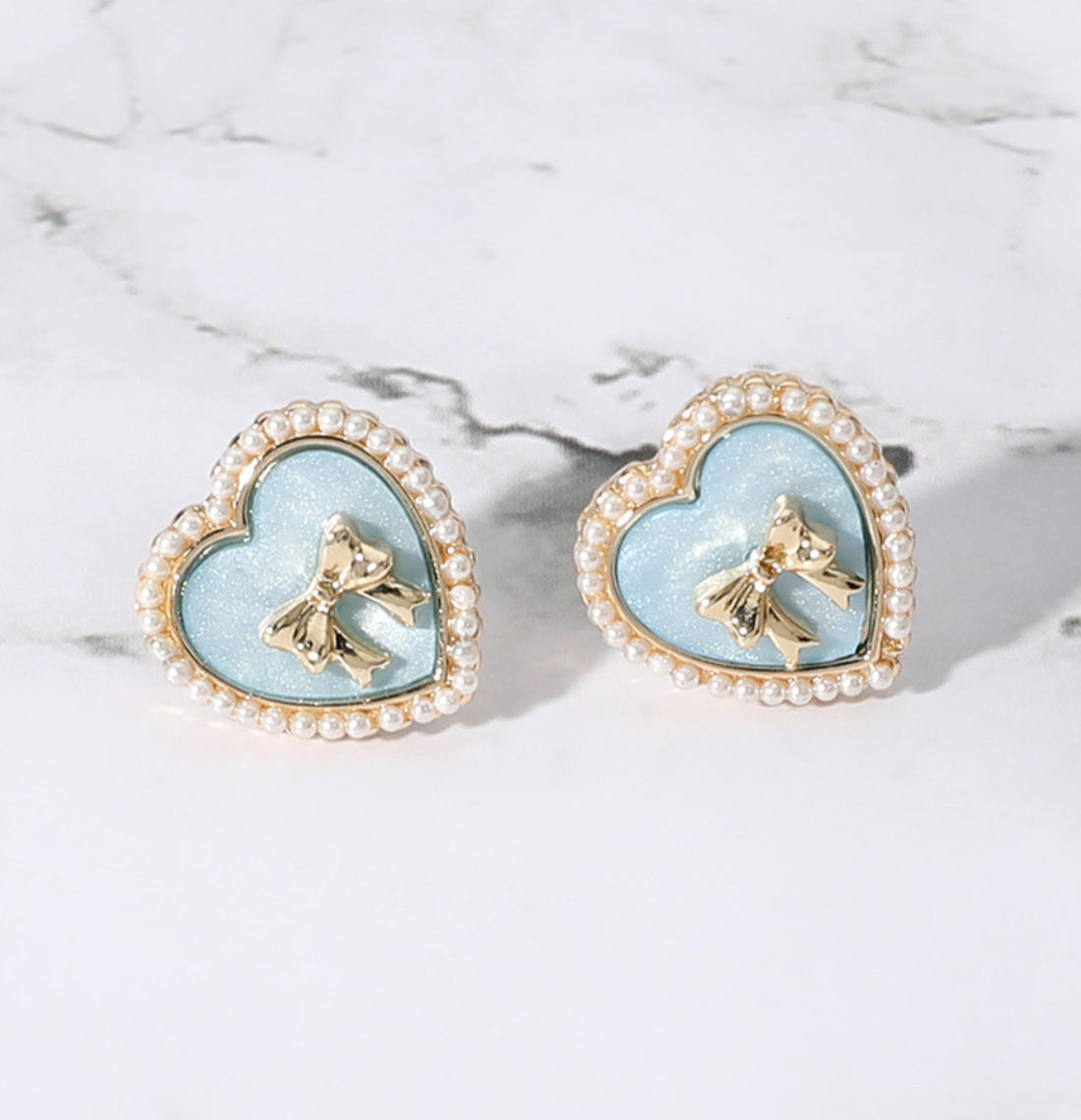 Pearl Paved Rim Metal Bow Pointed Enamel Heart Stud Earrings