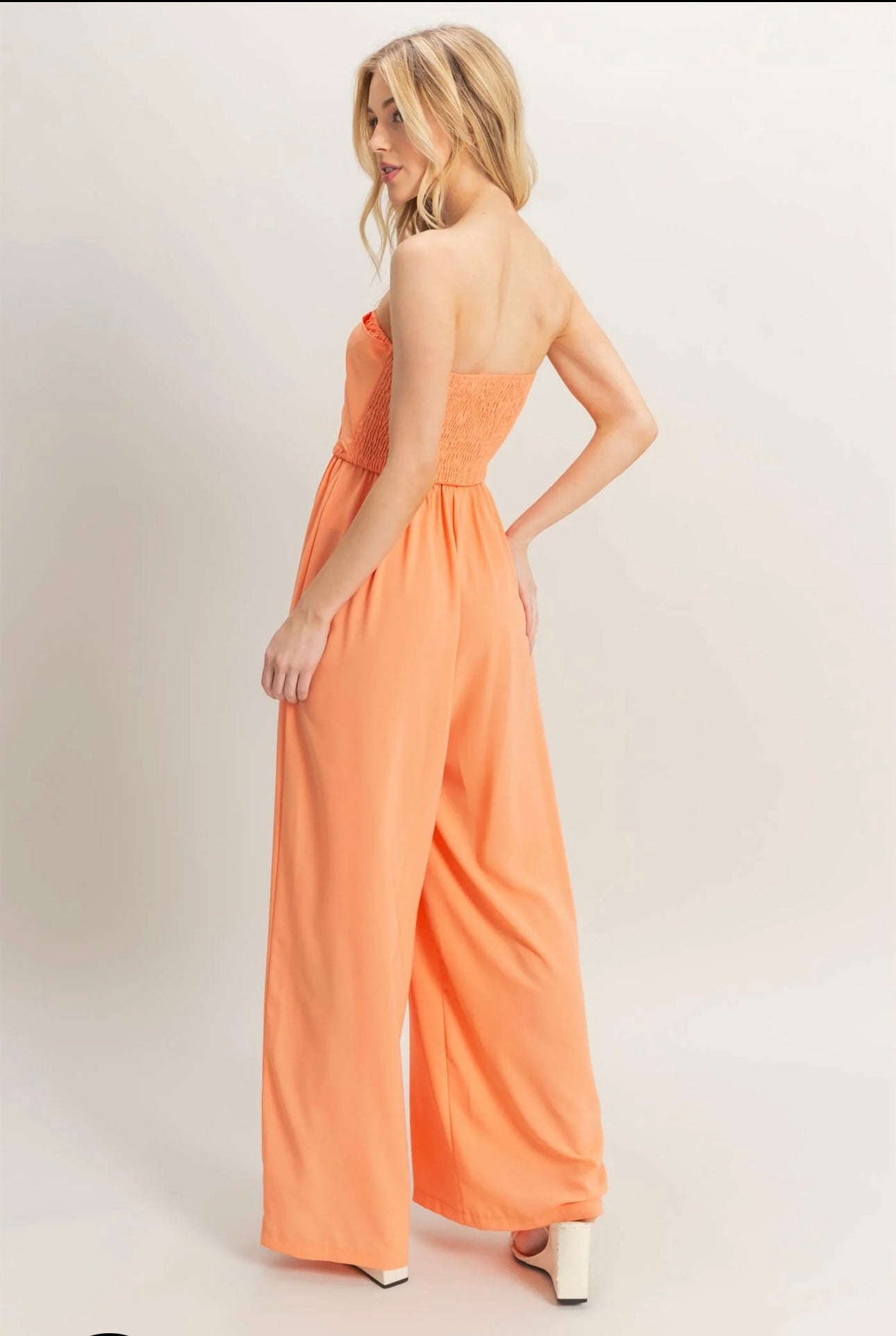 Strapless Tie Front Smocked And Flowy Legs Jumpsuit