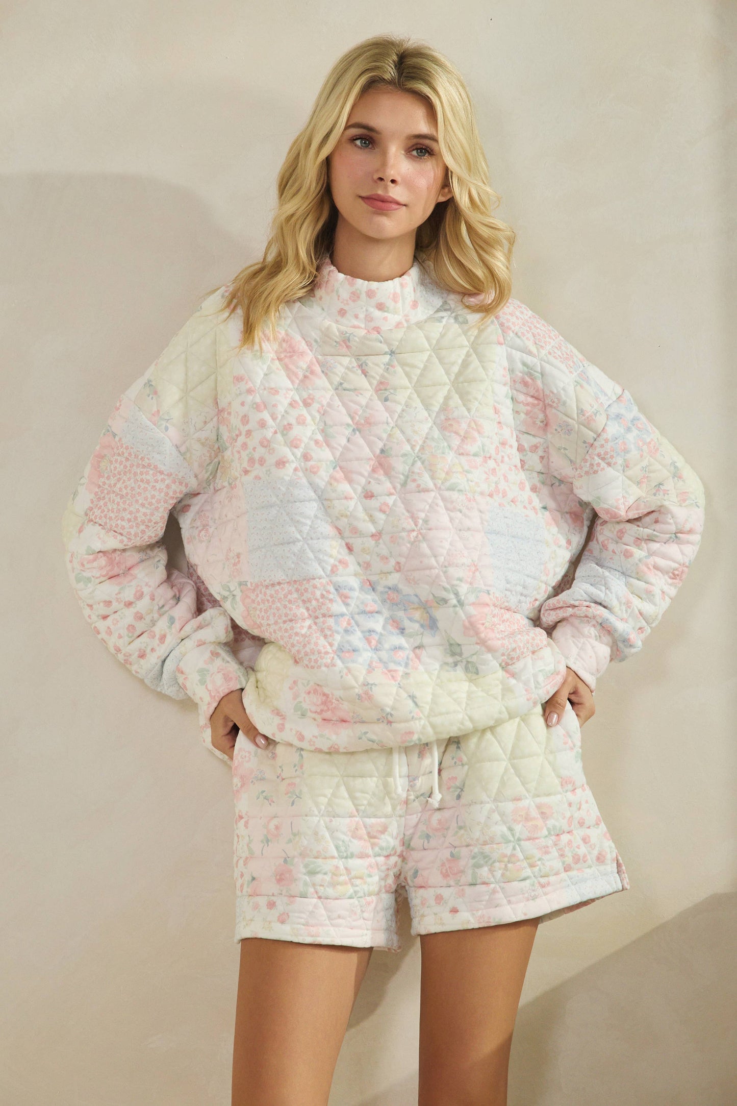 Floral textured mock neck quilted sweatshirt