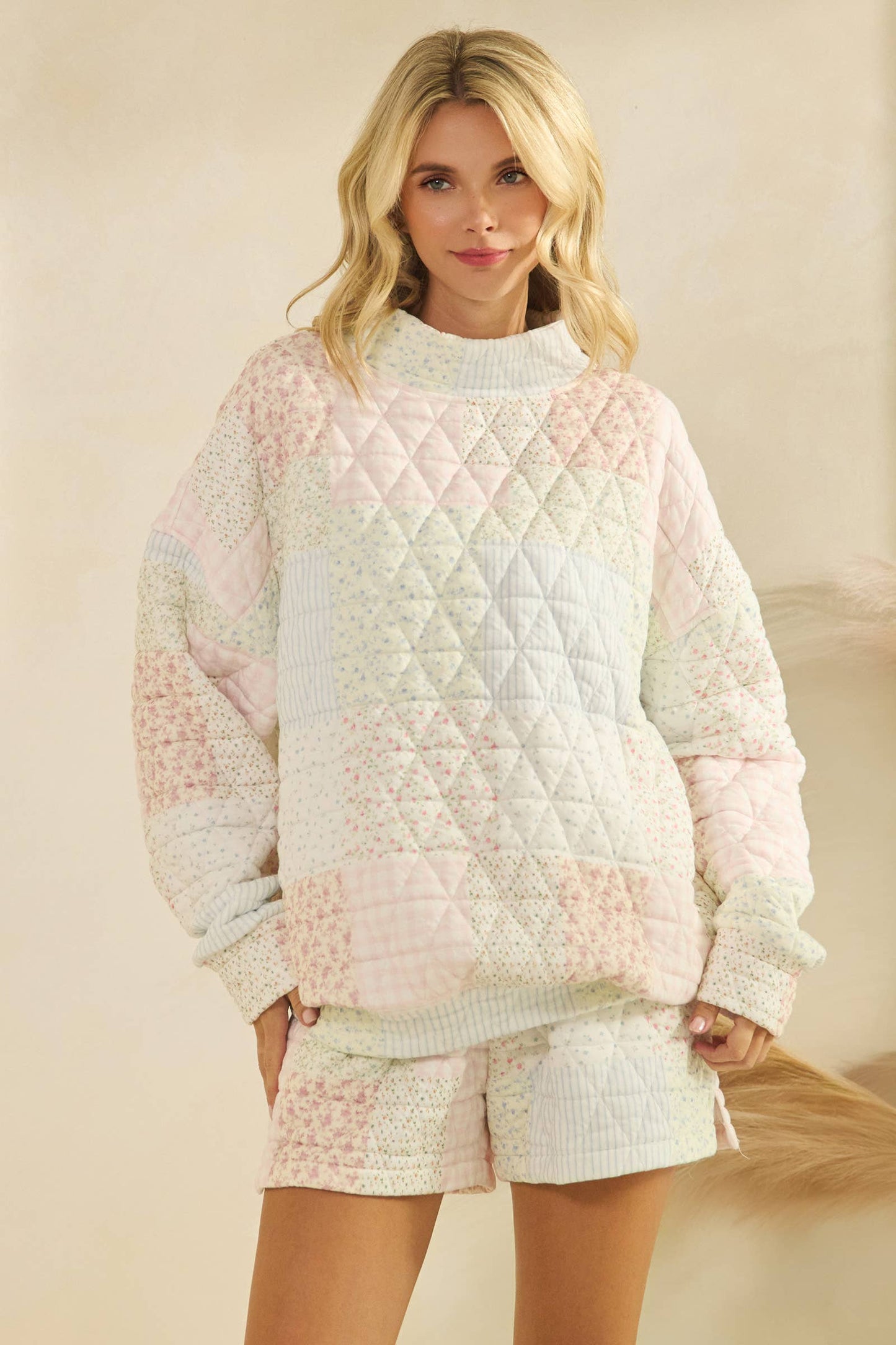 Floral textured mock neck quilted sweatshirt