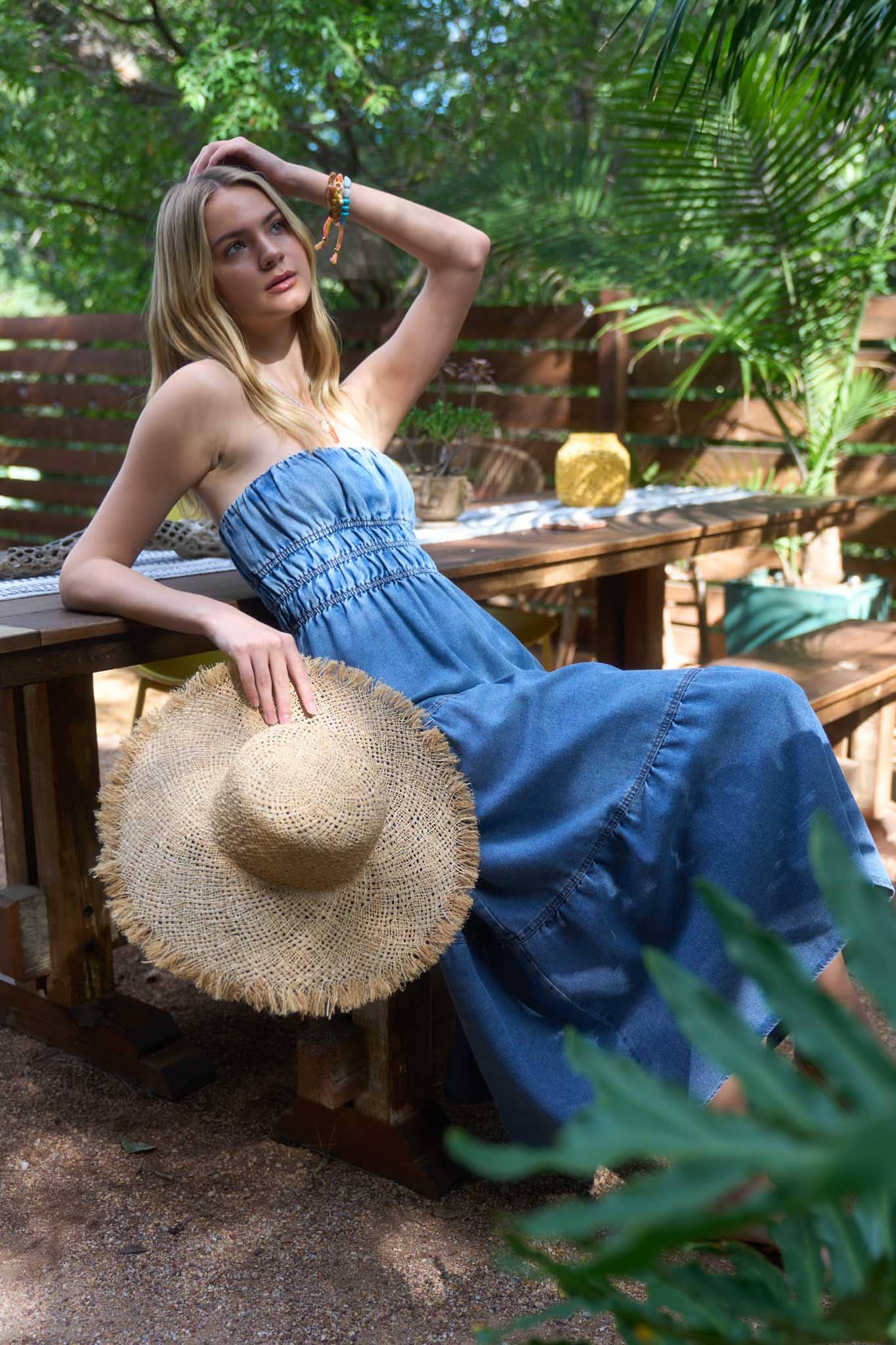 STRAPLESS SHIRRED TIERED DENIM MIDI DRESS