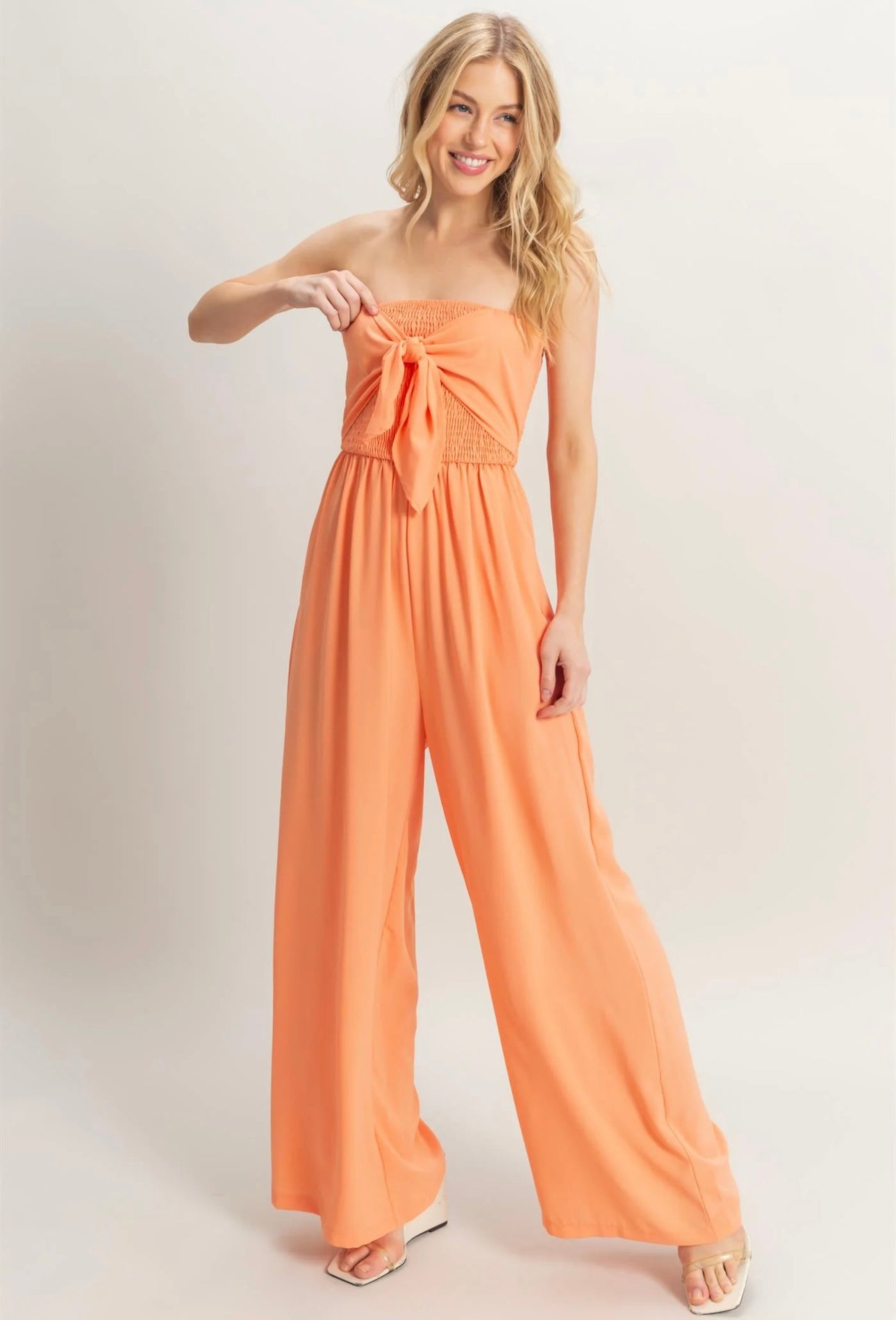 Strapless Tie Front Smocked And Flowy Legs Jumpsuit