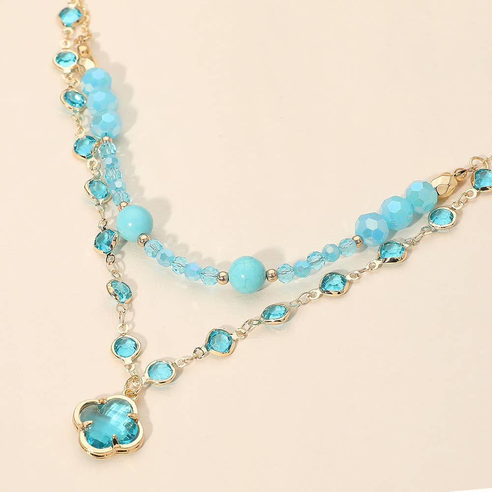 Quatrefoil Pendant Accent Dual Layer Beaded Necklace