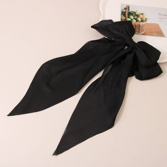 SIMPLE TEMPERAMENT BOW HAIR CLIP: Black