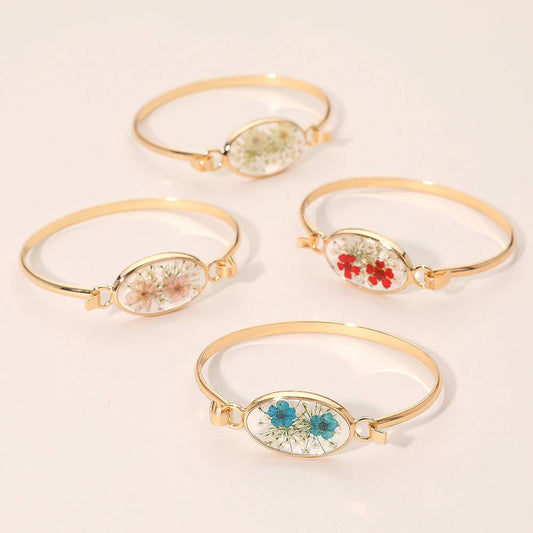 Floral Encased Oval Accent Bangle Bracelet: Gold,White